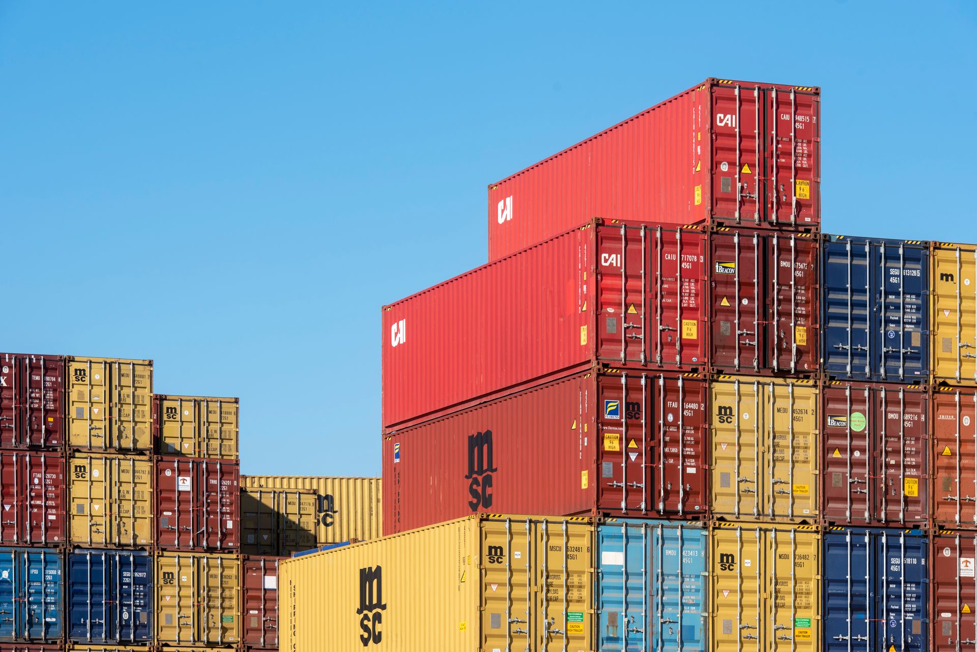Stacked shipping containers at port